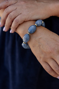 Soreli - armband op elastiek - blauw/goud